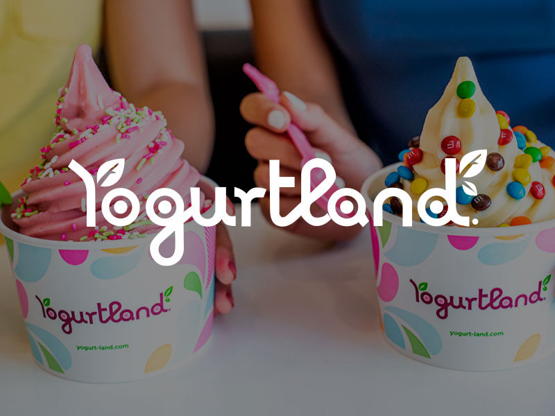 Yogurtland logo over an image of One large pink frozen yogurt covered in sprinkles and one large vanilla frozen yogurt covered in M&M's from Yogurtland.